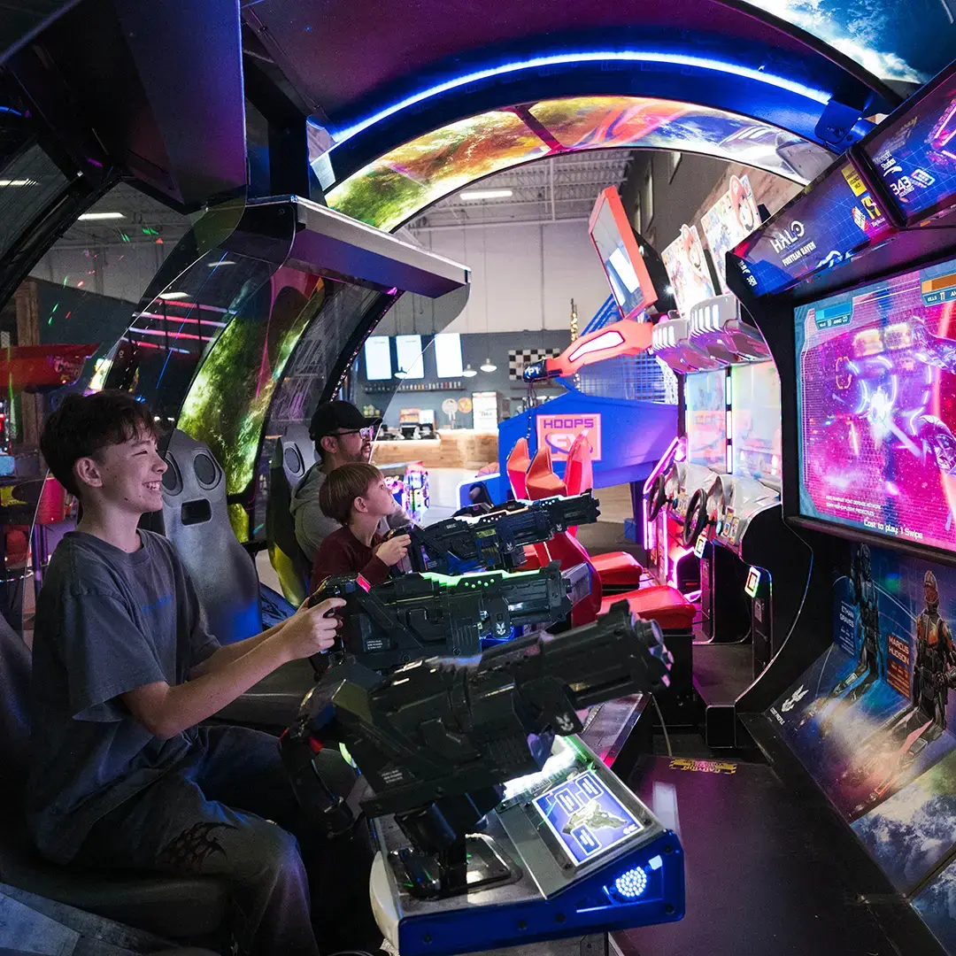 kids playing Halo with their dad